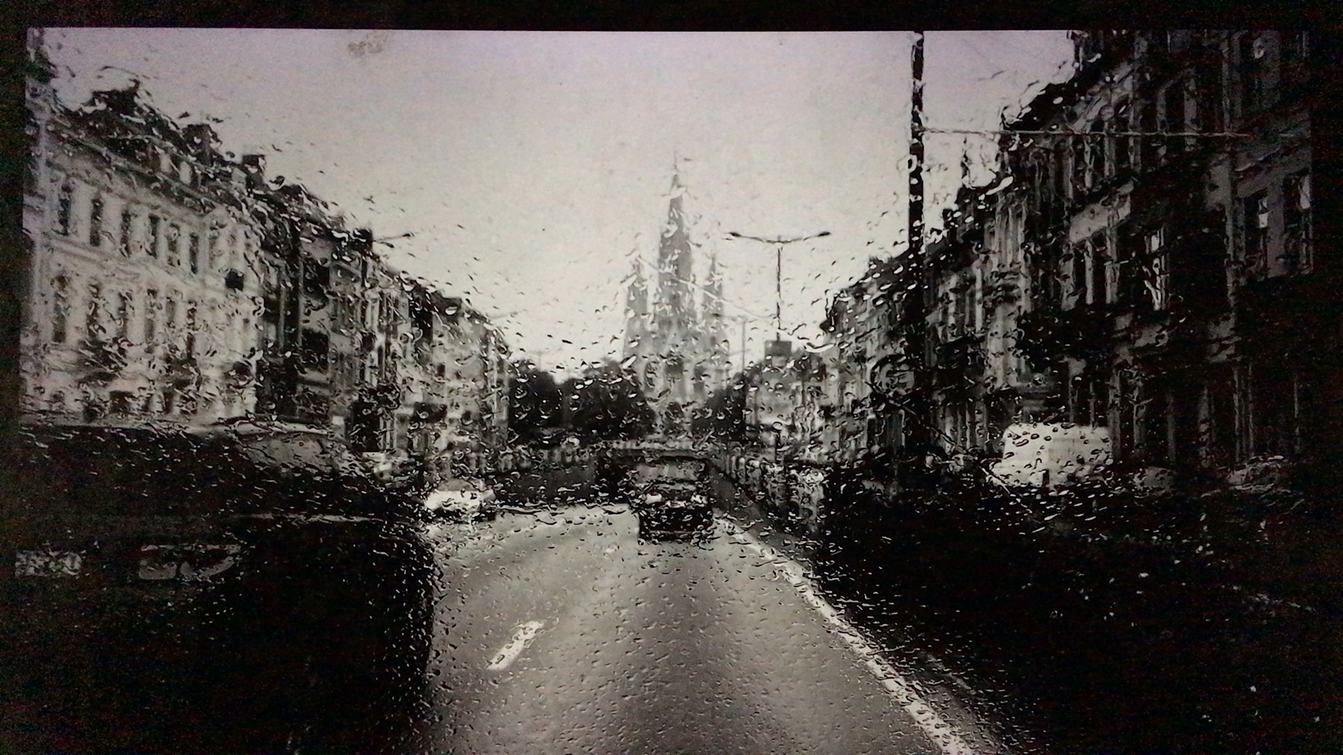 Rain seen through a van window in Brussels